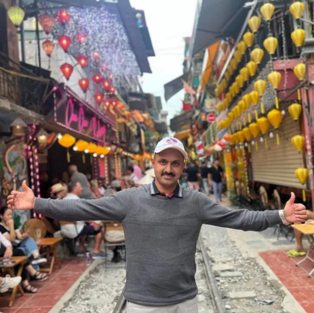 Mr. Dada Peer, Founder of Oyster Holidays India, at Train Street in Hanoi, Vietnam