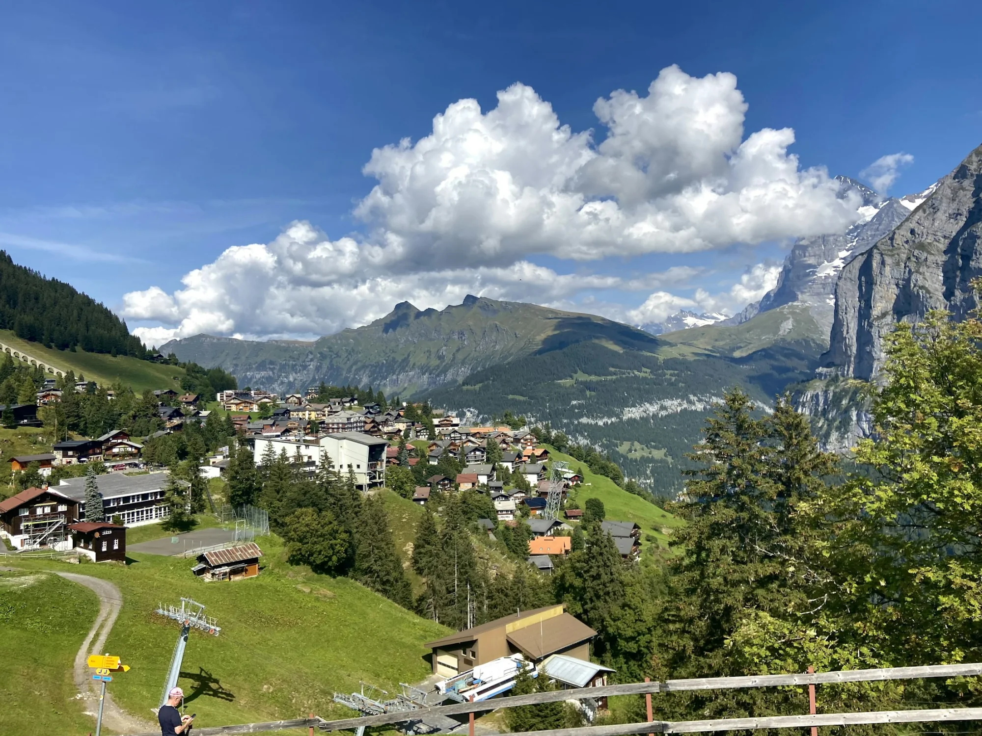 An alpine village beneath the peaks of the Swiss Alps