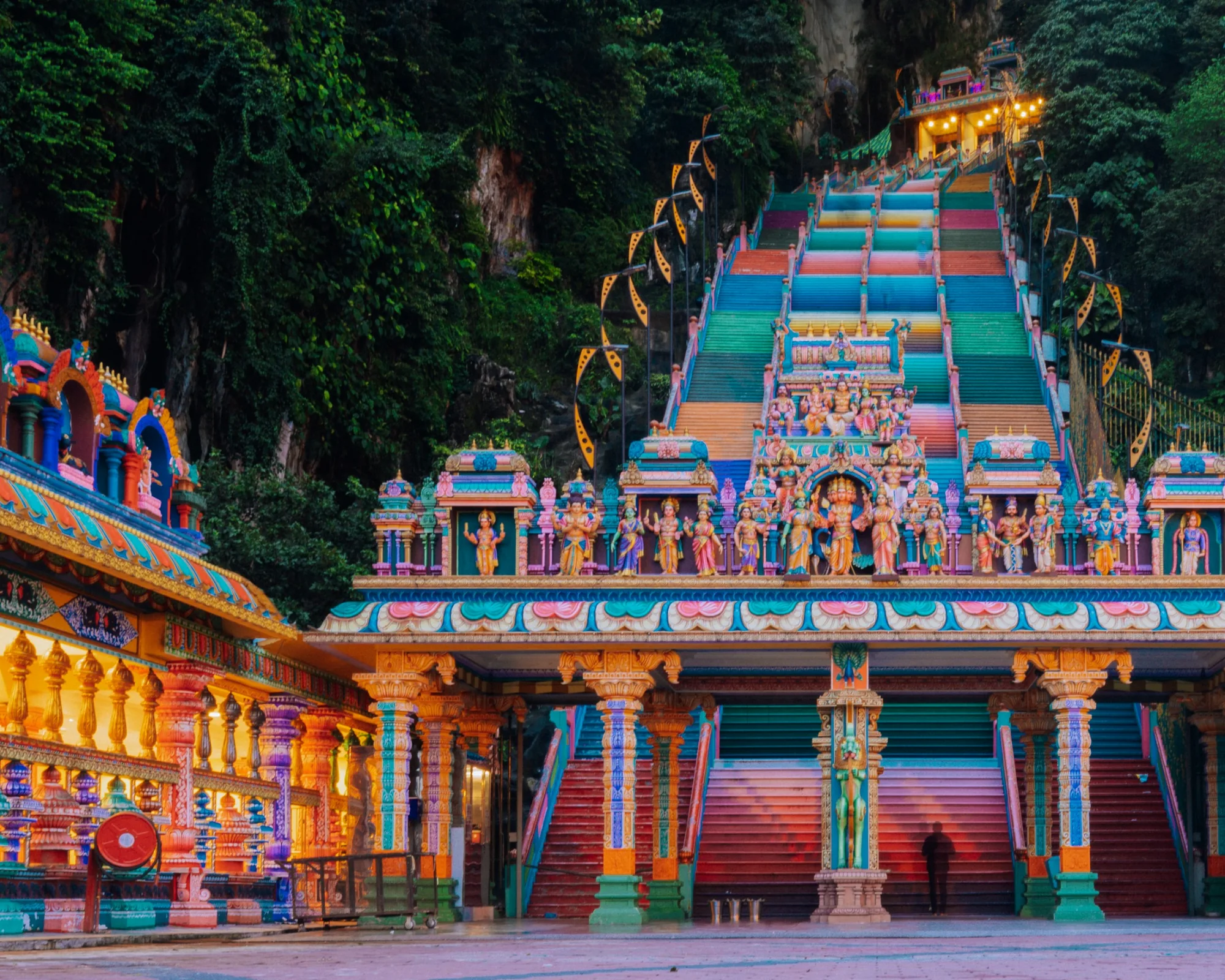 The rainbow steps and golden statue at Batu Caves near Kuala Lumpur