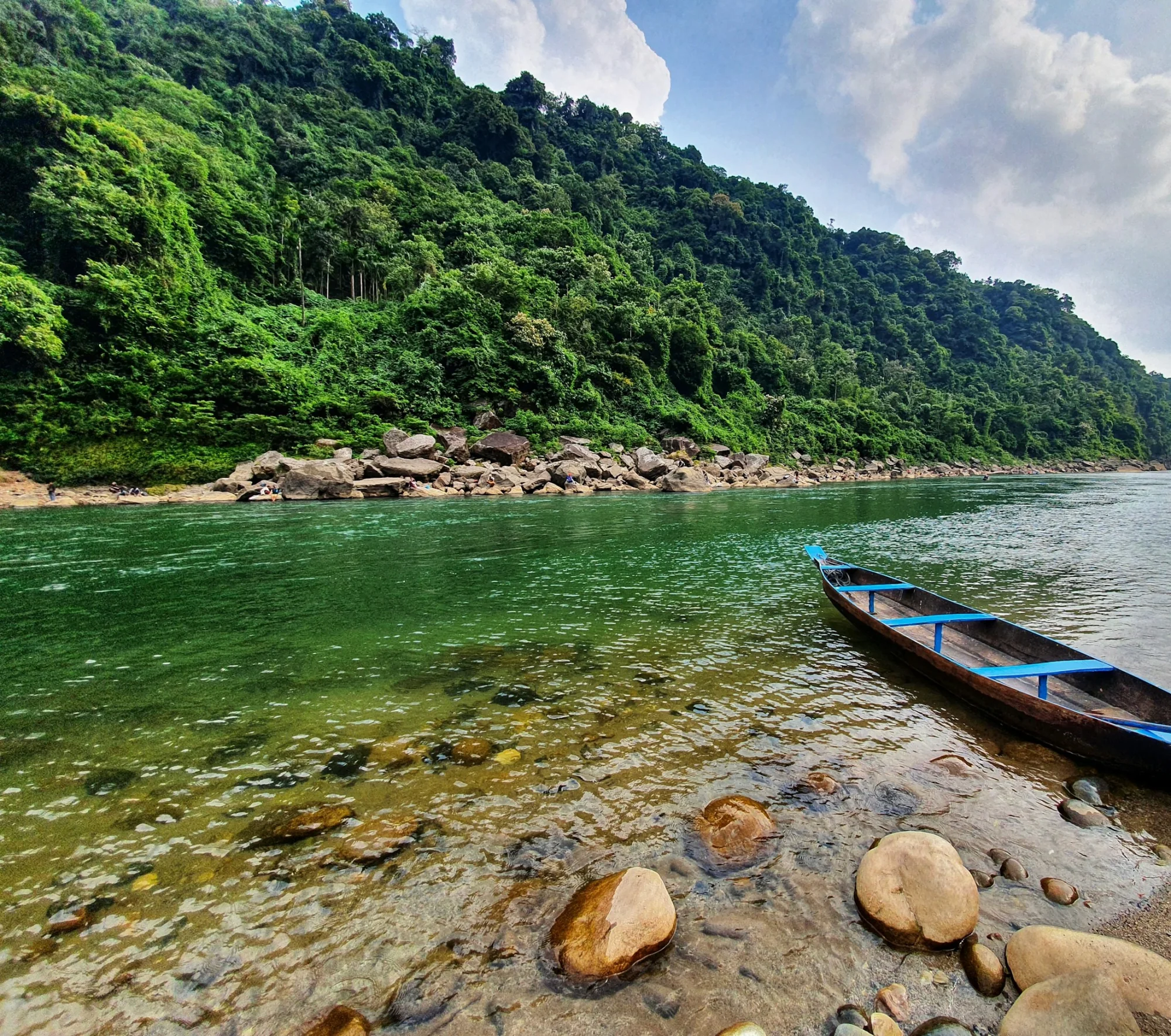 Wooden boats on the transparent Umngot River at Dawki, Meghalaya