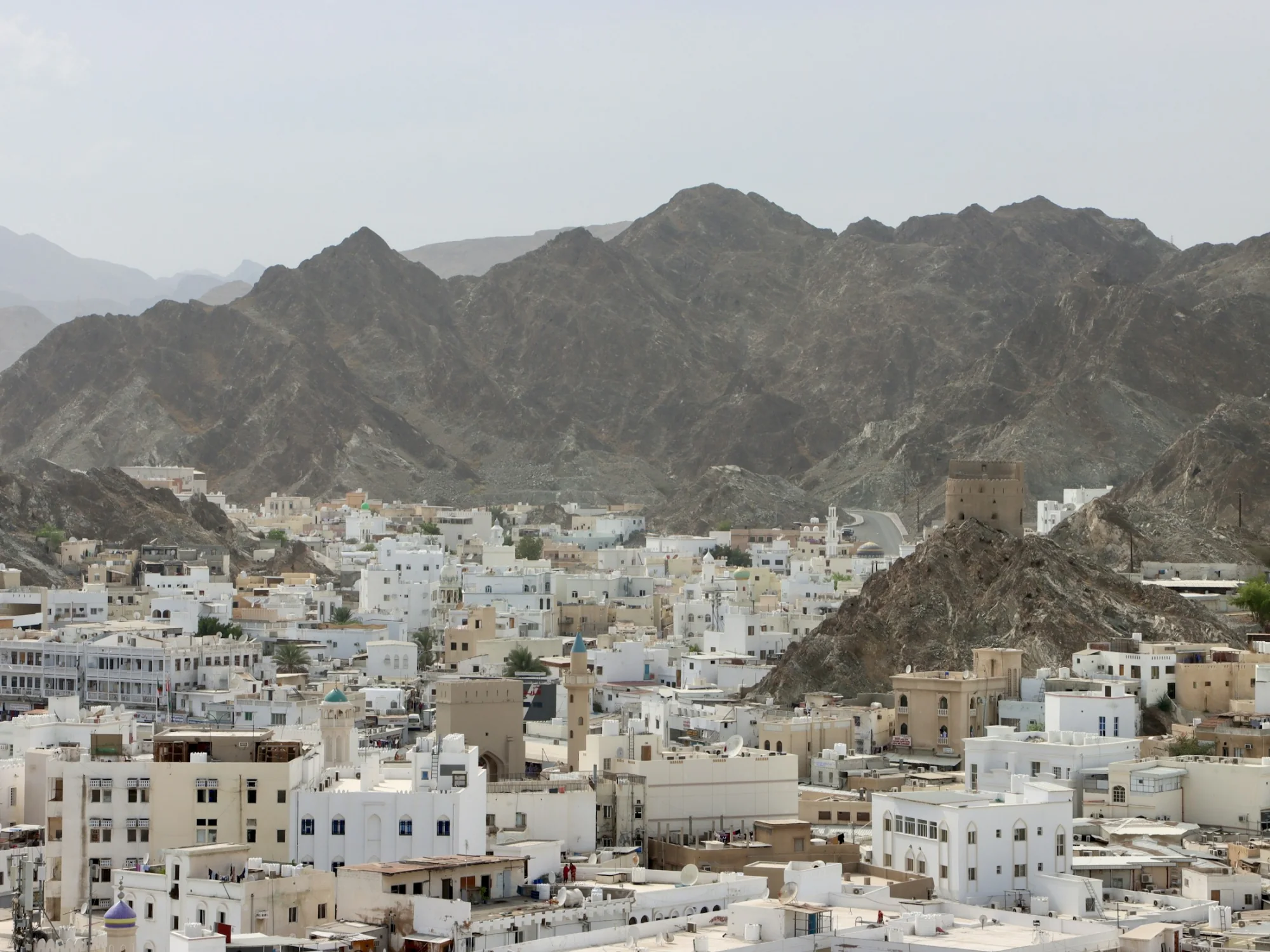 The Mutrah waterfront and mountains in Muscat, Oman