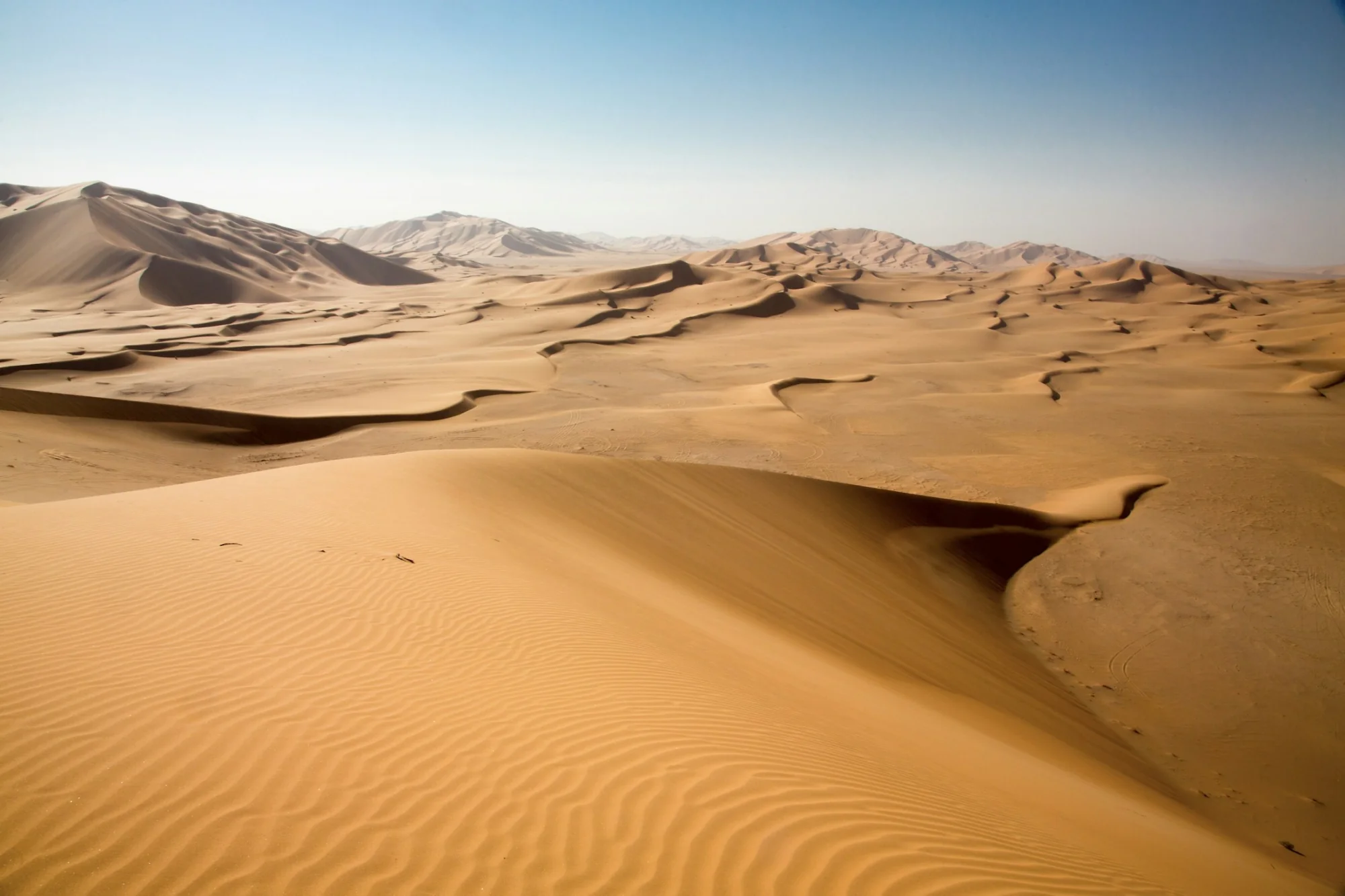 Rolling dunes of the Wahiba Sands desert in Oman