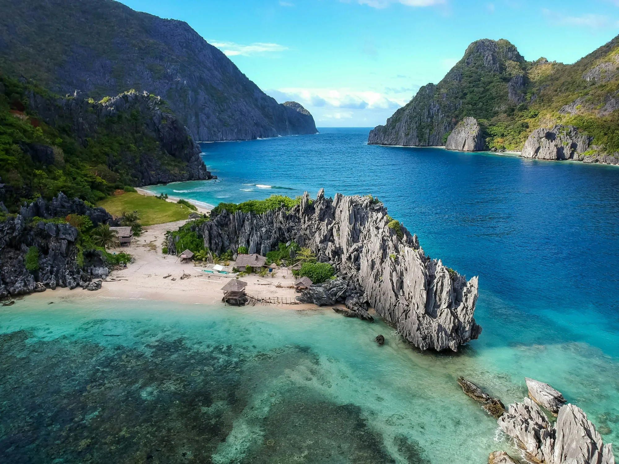 Aerial view of a lagoon between limestone mountains in Palawan, Philippines