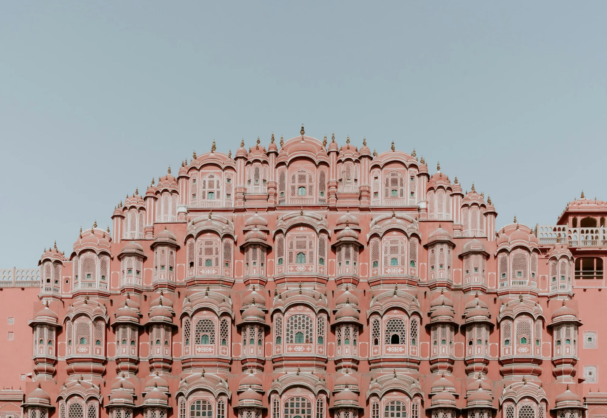 The pink honeycomb facade of the Hawa Mahal in Jaipur, Rajasthan