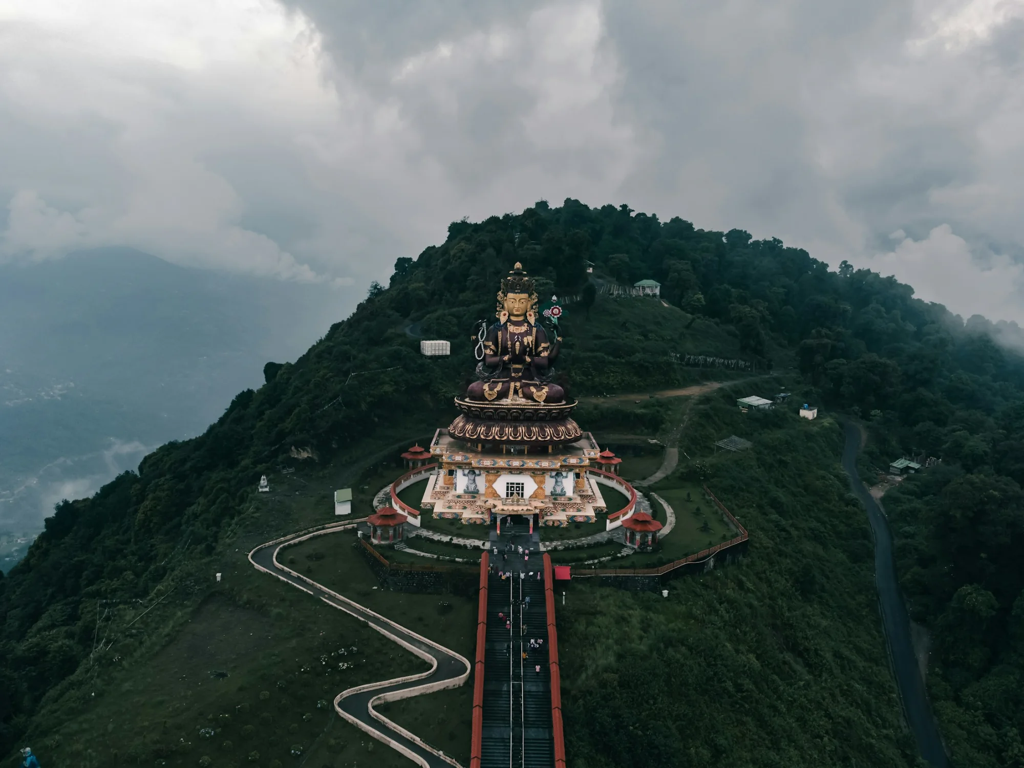 Aerial view of a hilltop Buddha statue in Sikkim