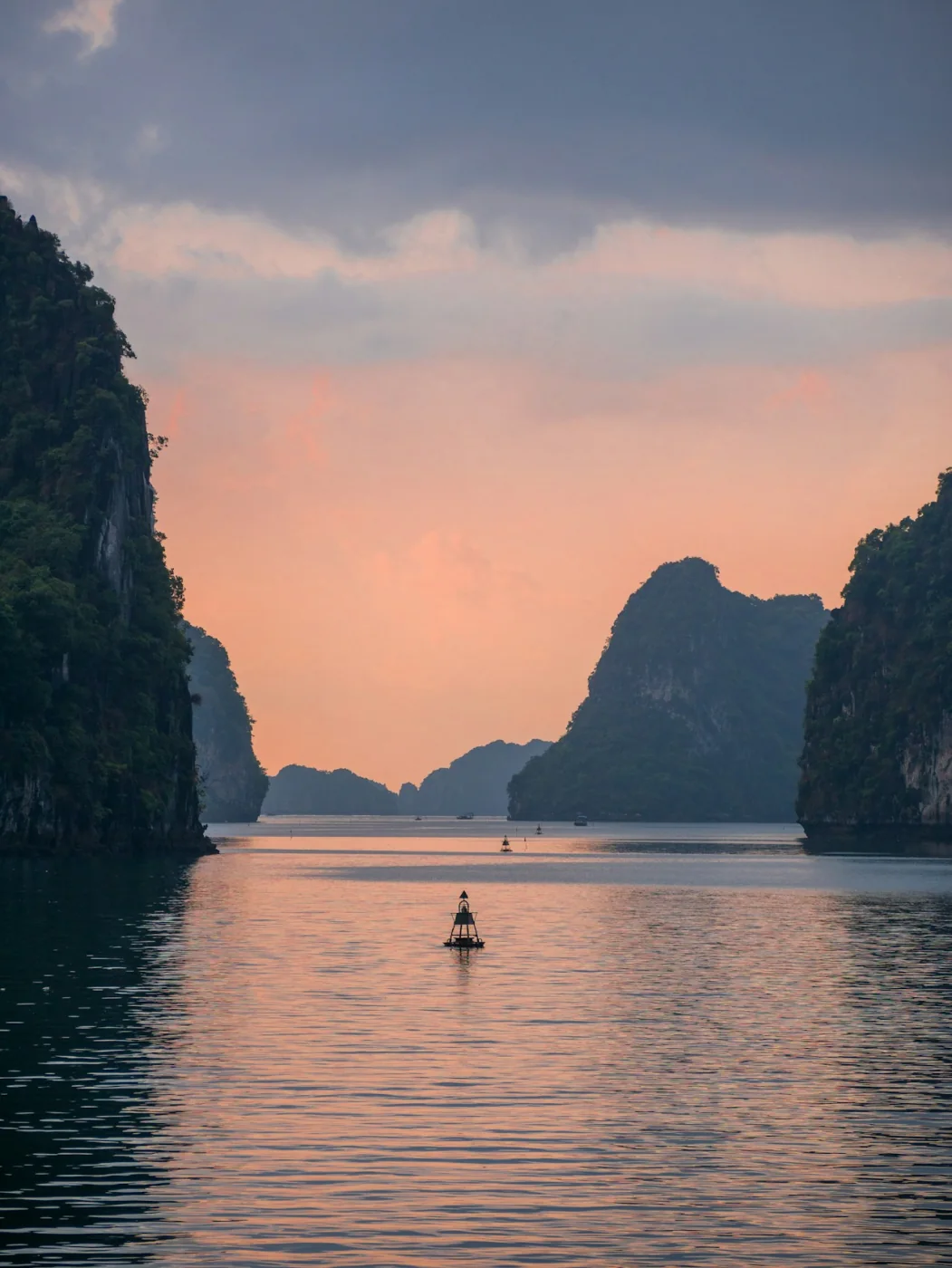 Limestone islands rising from the sea at Ha Long Bay, Vietnam